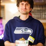 A man hold a Christmas gift